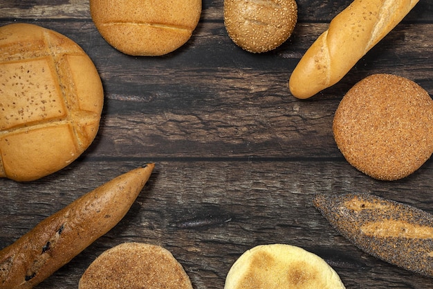 Background of assorted breads from above Bakery food Healthy food concept flat lay