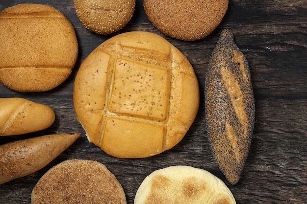 Background of assorted breads from above Bakery food Healthy food concept flat lay