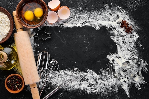 The background of baking rolling pin flour egg dough Top view Free copy space