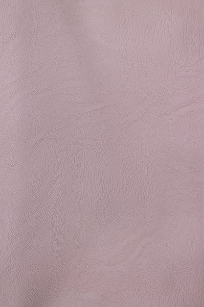 Background beige imitation leather closeup