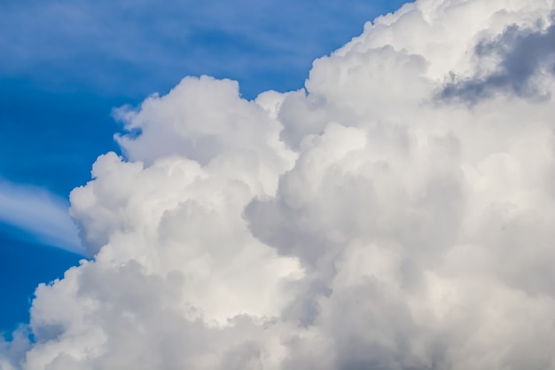 Background of blue sky with white clouds