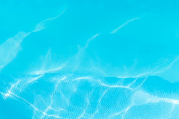 Background of blue water in the pool.