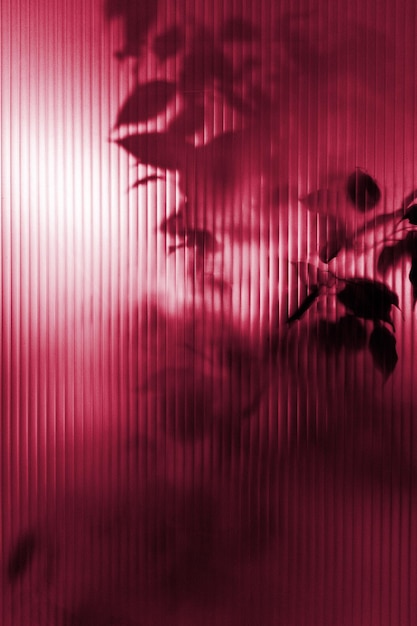 Background of blurry plants behind glass. New 2023 trending PANTONE 18-1750 Viva Magenta colour