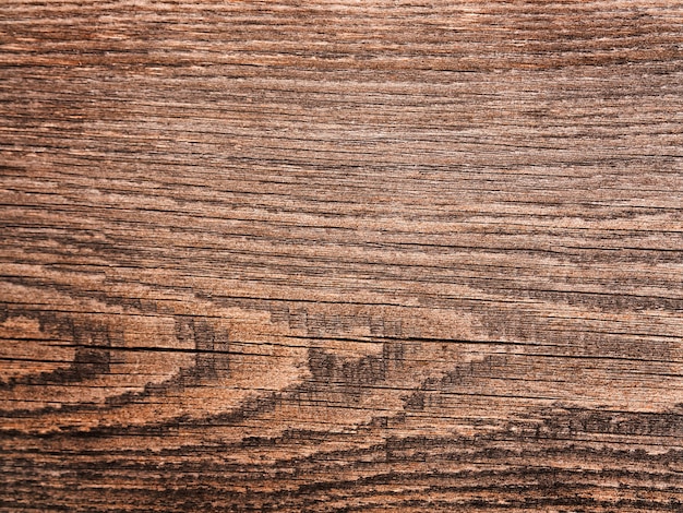 Background of boards painted with light brown paint, old, texture with cracks