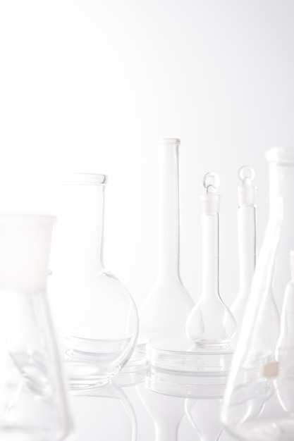 Background for branding and product presentation. Empty ÃÂhemical, biological science laboratory glassware collection .