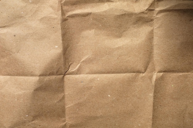 Background of brown wrapping crumpled paper. close-up