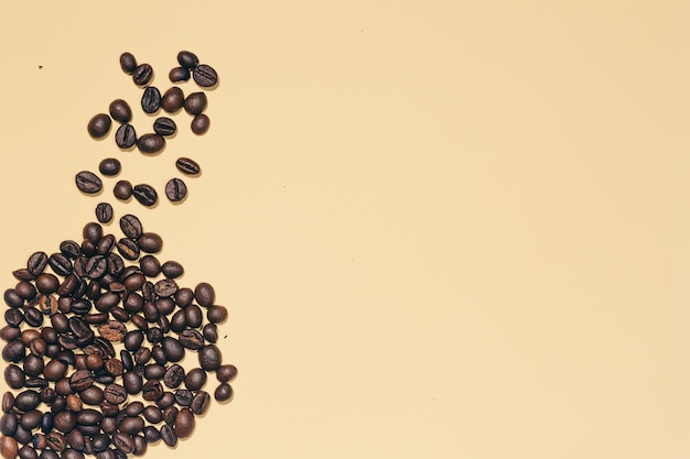 Background, coffee, coffee beans on white and beige background, copy space, corner