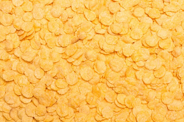 A background of corn flakes in a close up view