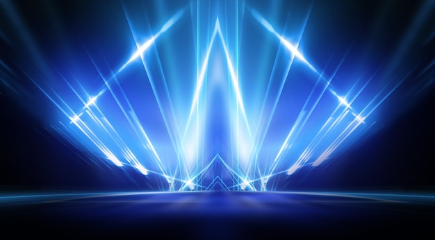 Background of empty stage show. Neon light and laser show. Laser futuristic shapes on a dark background. Blue neon light, symmetrical reflection.