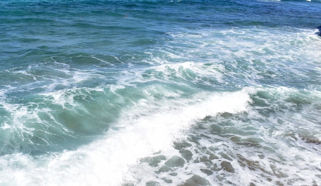 background of foaming blue waves