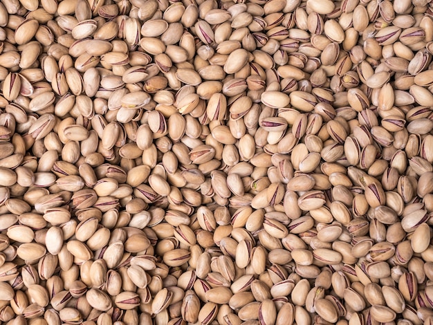 Background from a dry kernels of pistachio.