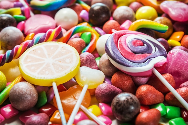 Background from variety of sweets, lollipops, chewing gum, candi