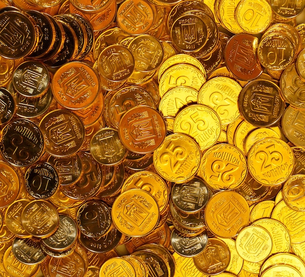 Background of the golden coins of Ukraine