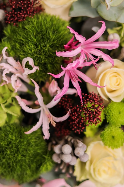 Background image of a beautiful bouquet of flowers Carnations white roses green chrysanthemum