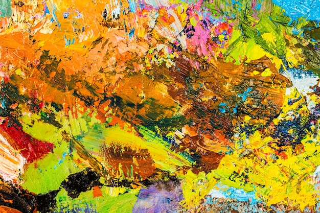 Background image of bright oilpaint palette closeup