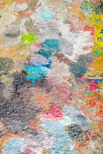 Background image of bright oilpaint palette closeup