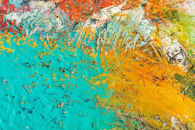 Background image of bright oilpaint palette closeup