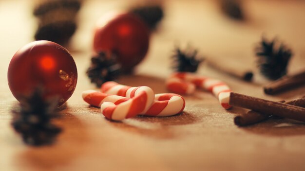 Background image cookies,Christmas balls and cones on wooden background.photo with copy space. balls