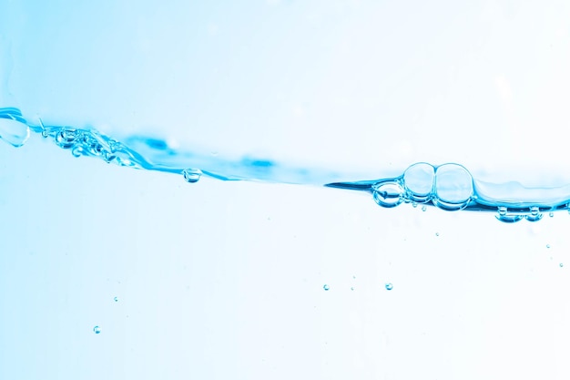 Background image of moving water in wavesbubbles on white background