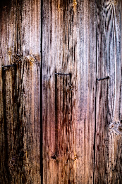 The background is made of old wooden planks Closeup of the old wooden wall