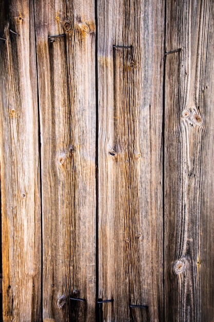 The background is made of old wooden planks Closeup of the old wooden wall