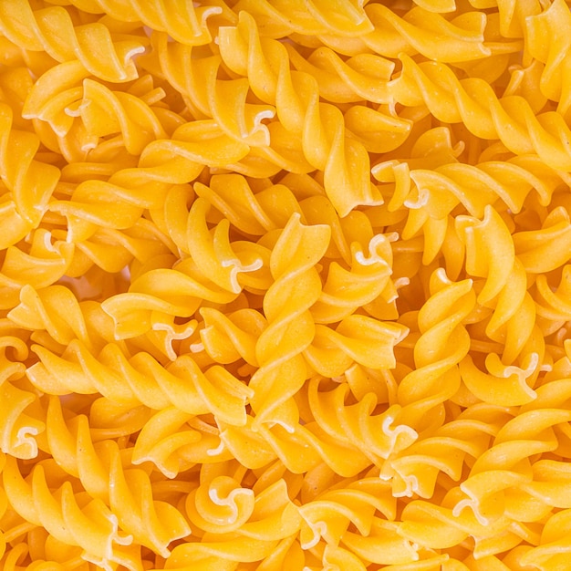 A background of Italian fusilli noodles. Taken in Studio with a 5D mark III.