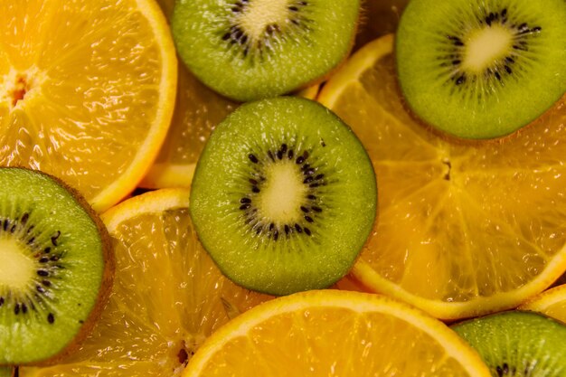 Background of the kiwi and orange fruits