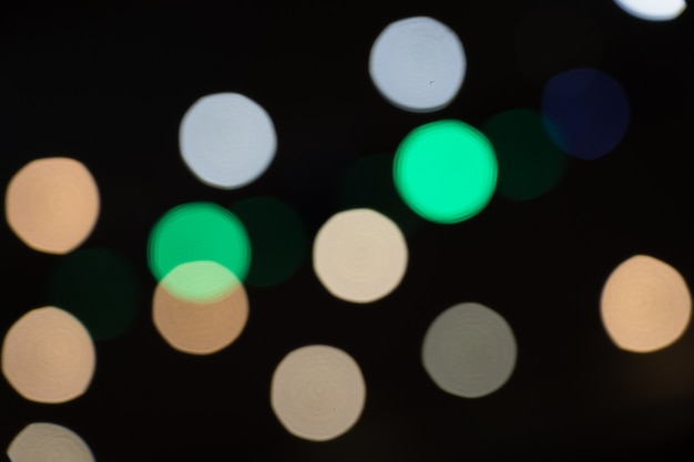 Background of light bokeh from spotlight in night place.