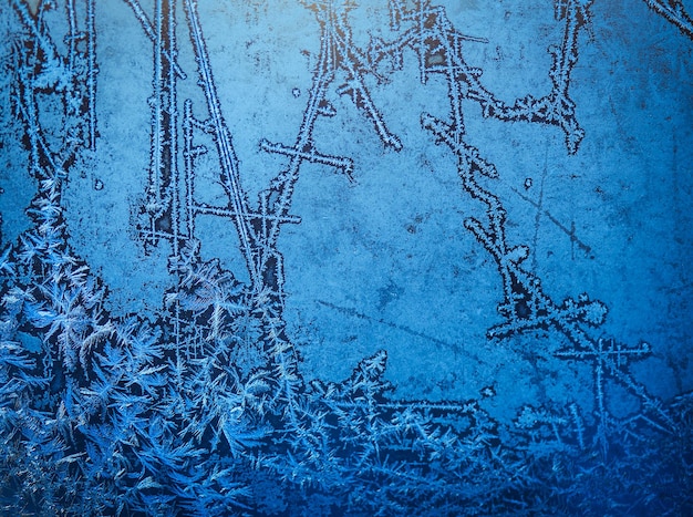 Background made of winter frozen window glassxA