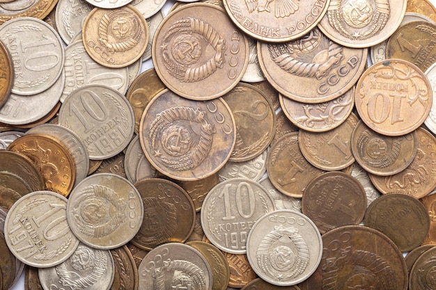 Background of old USSR coins of rubles and kopecks of various denominations The ruble and kopeck is the national currency of the USSR Money concept