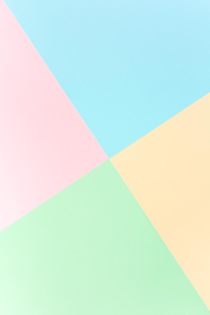 Background pastel colors pink yellow blue green geometric pattern papers minimal concept flat lay to