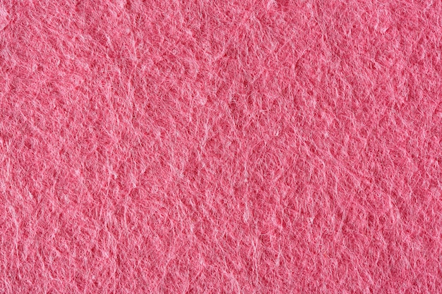 Background of pink felt. High quality texture on macro.