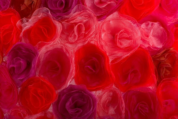 Background of the red fabric flowers