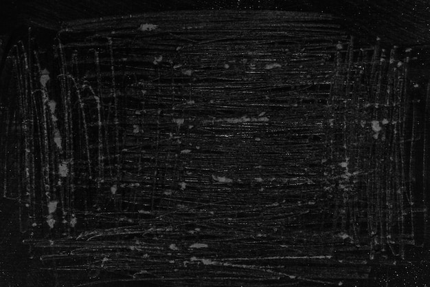 Background of scratched wood metal paper For an inscription Add your caption Grunge stylish black dark Darkness