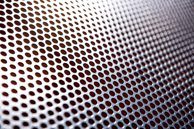 Background sheet of metal with circular holes