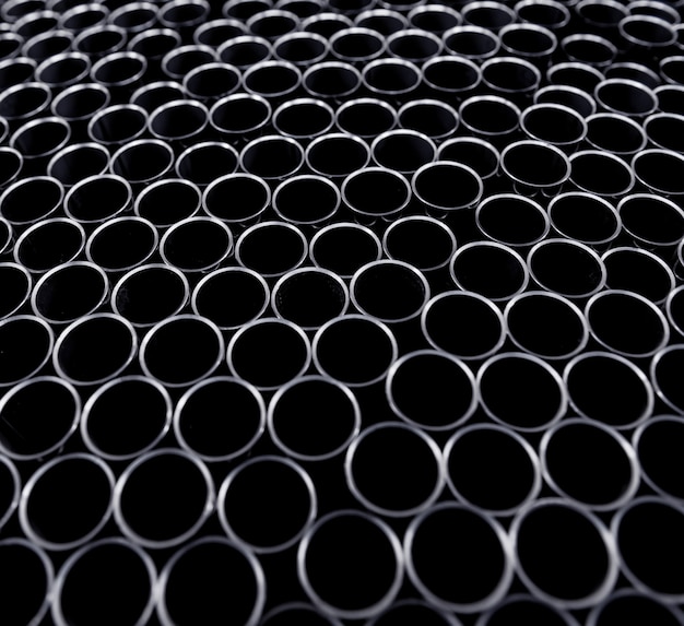 Background of steel pipes stacked on a pallet