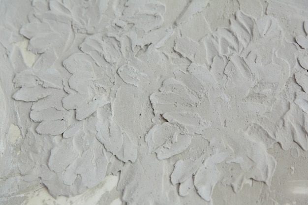 Background and texture of a bas-relief pattern on a concrete wall