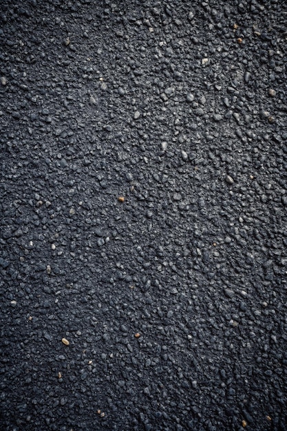 background texture of dark gray asphalt top view