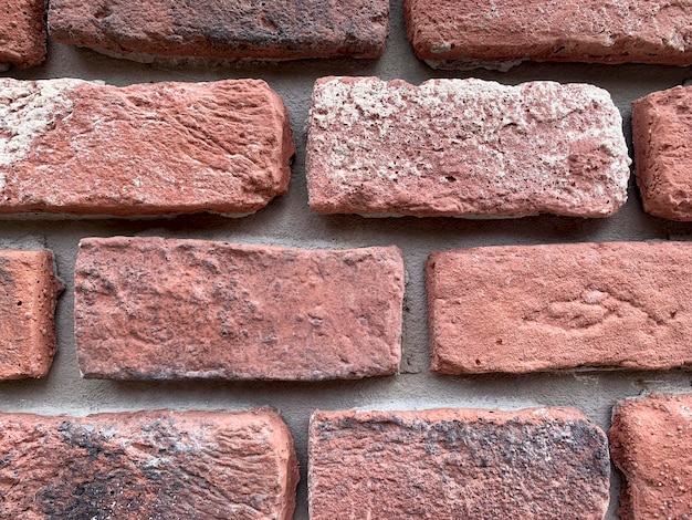 Background texture of an old red brick wall Studio Photo