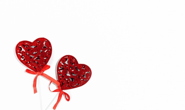 Background for Valentines Day Red creative hearts with bow isolated on white background Greeting card layout for Valentines Day