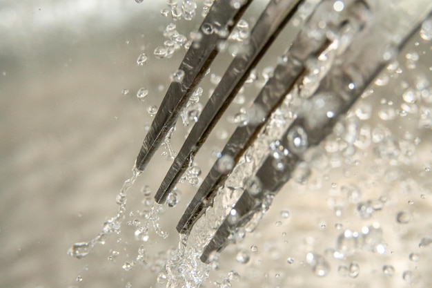 Background of water droplets of different shapes with shadows in gray tones