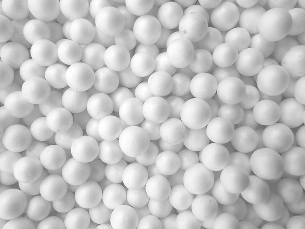 Background of white circle styrofoam ball pattern texture foam surface abstract background