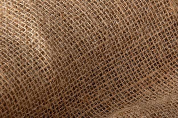 Background with beige jute fiber texture.