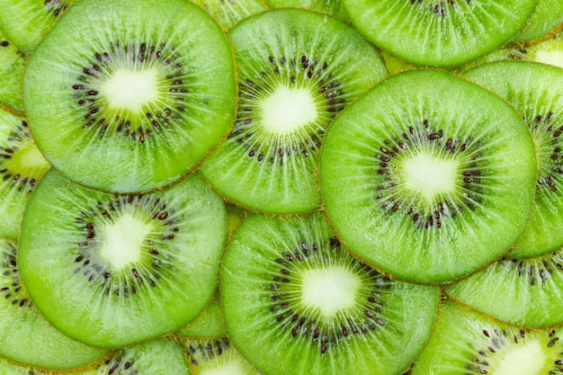 Background with fruit kiwi slices as texture