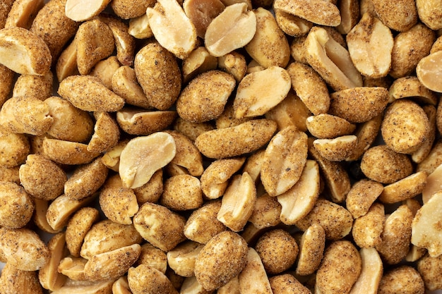 Background with nuts, close-up, nuts with hot pepper