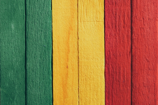 Background wood green, yellow, red old retro vintage style, rasta reggae flag