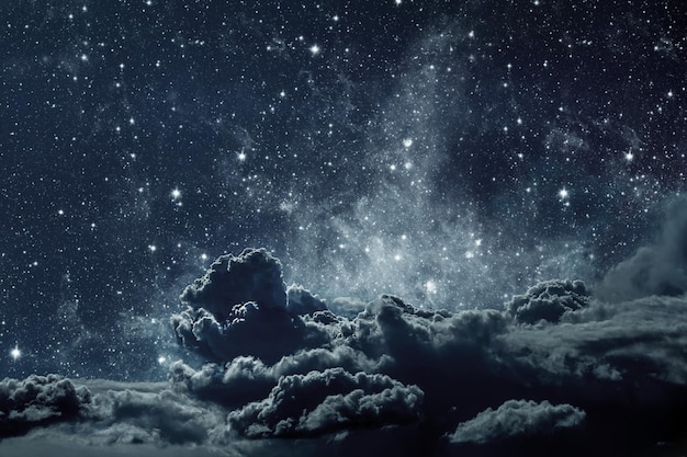 Backgrounds night sky with stars and clouds