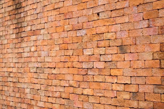 Backgrounds and pattern of ancient brick walls orange.