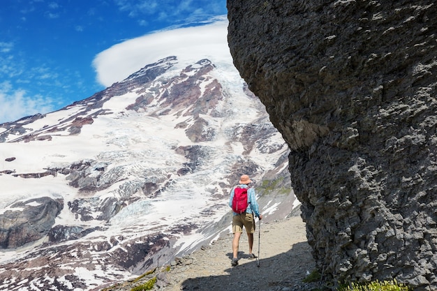 Backpacker in hike in the autumn mountains