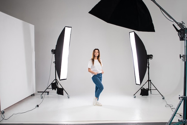 Backstage selfconfident woman equipment workplace photo studio concept Photography of fashion look